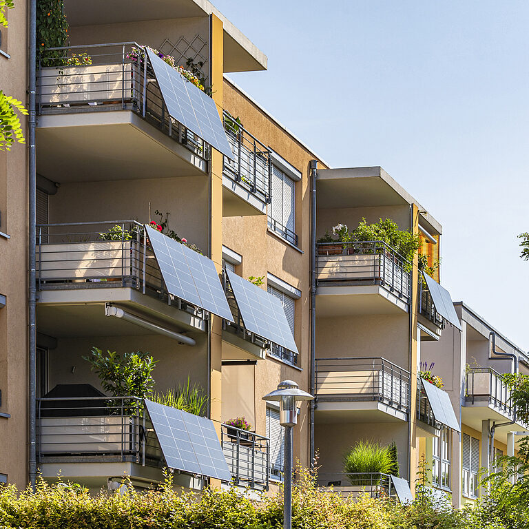 Home germany, baden wurttemberg, ostfildern, solar panels on apartment balconies
